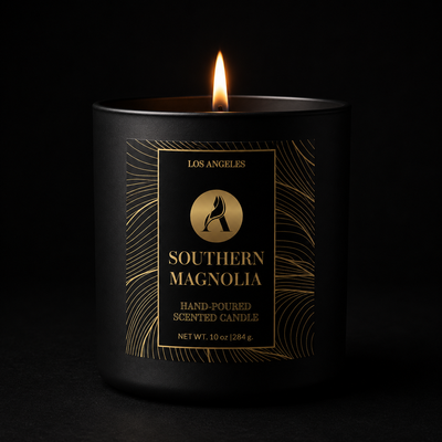 Black candle with gold label on a black background